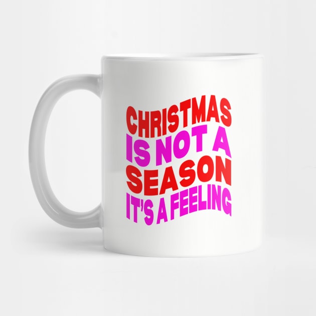 Christmas is not a season it's a feeling by Evergreen Tee